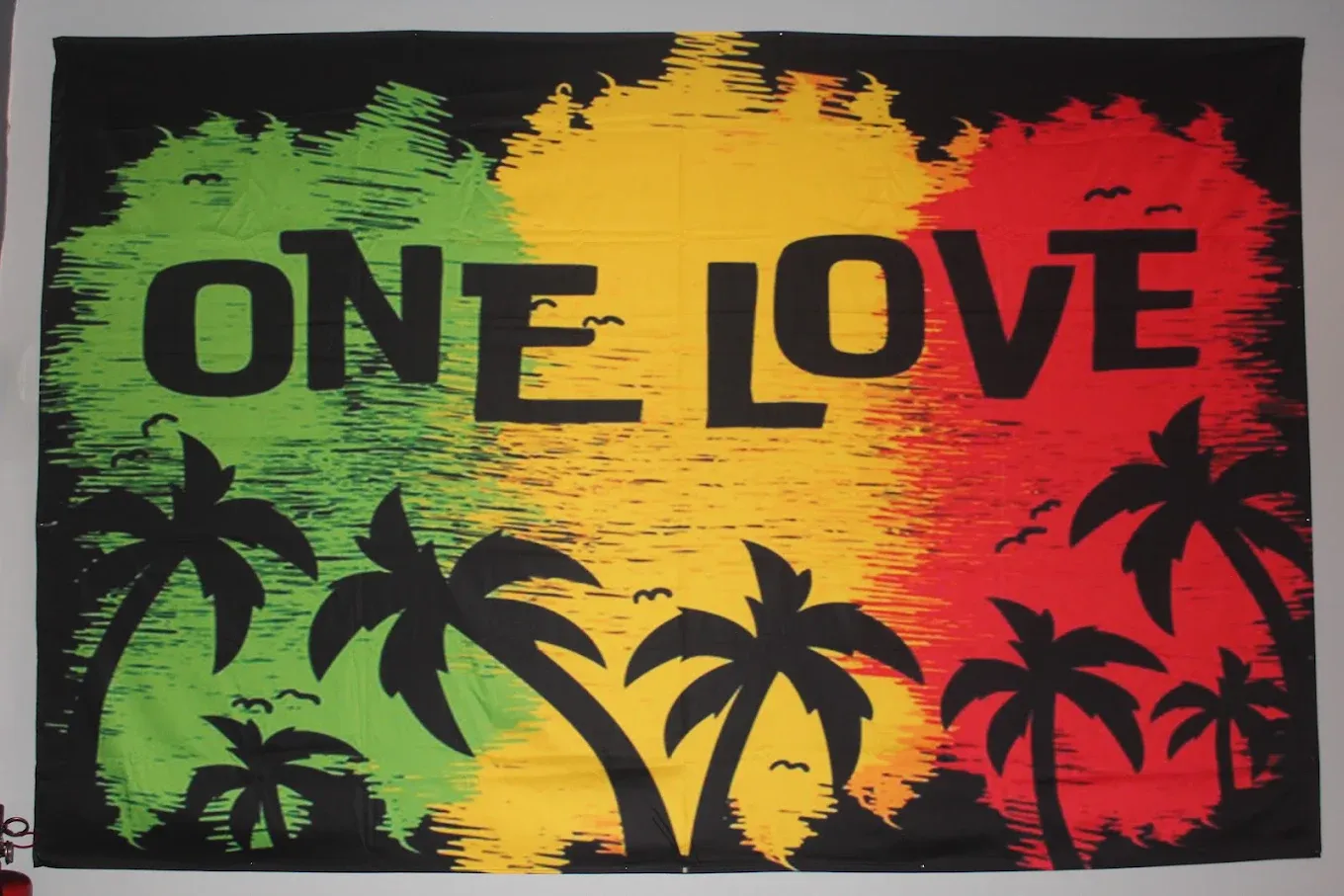 The One Love flag on the wall at Dose Shisha